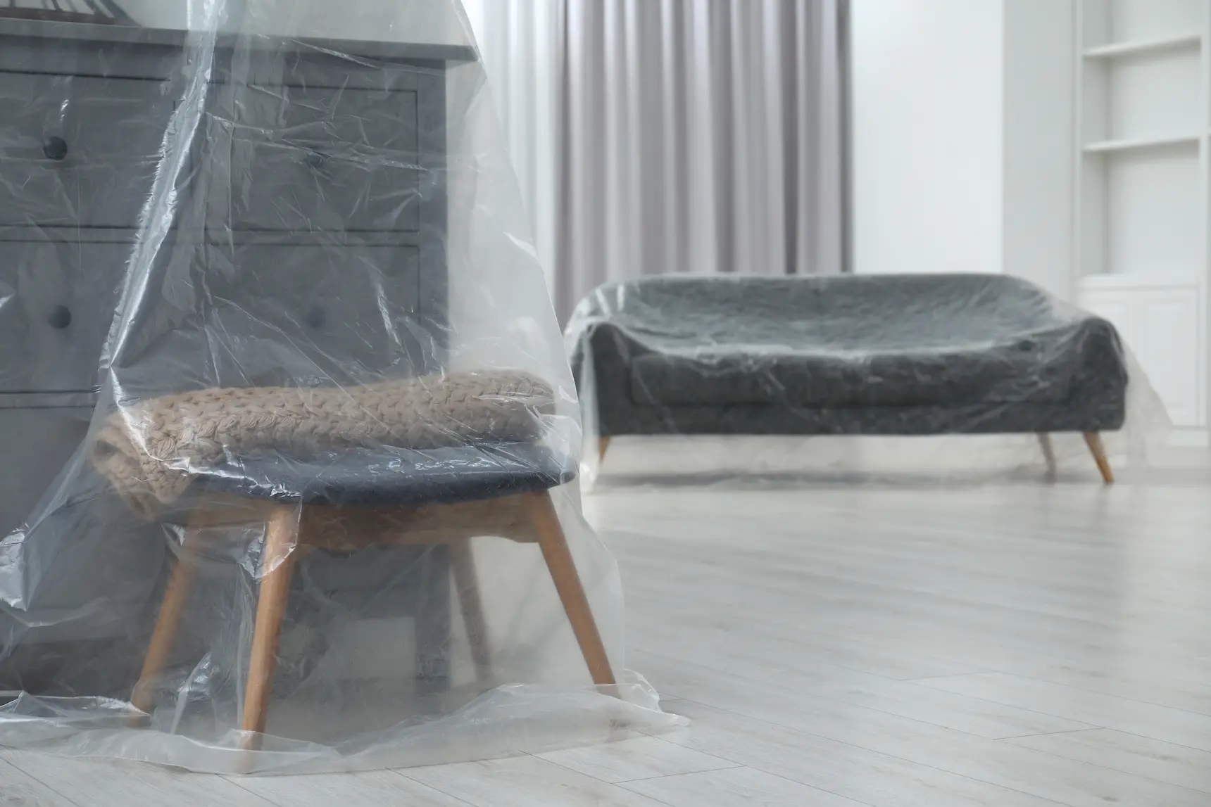 Furniture covered in plastic