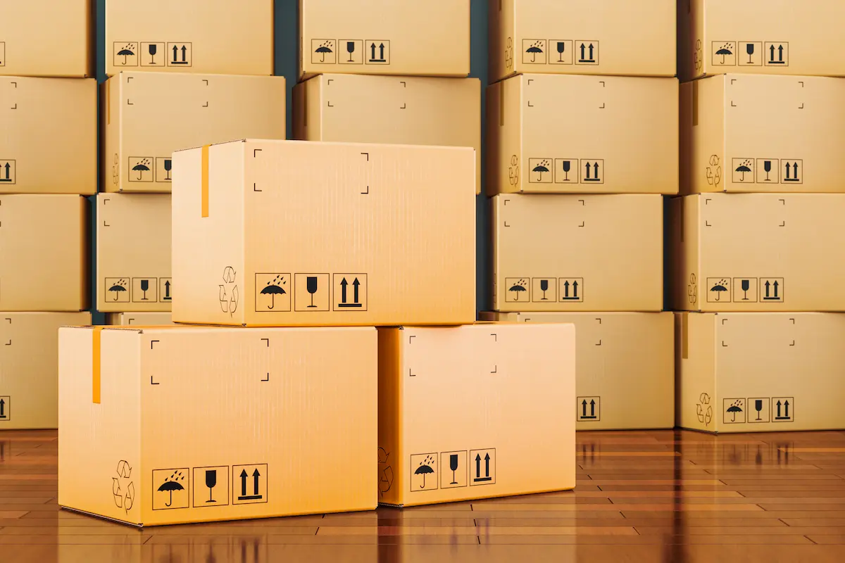 Stacked boxes on a hardwood floor